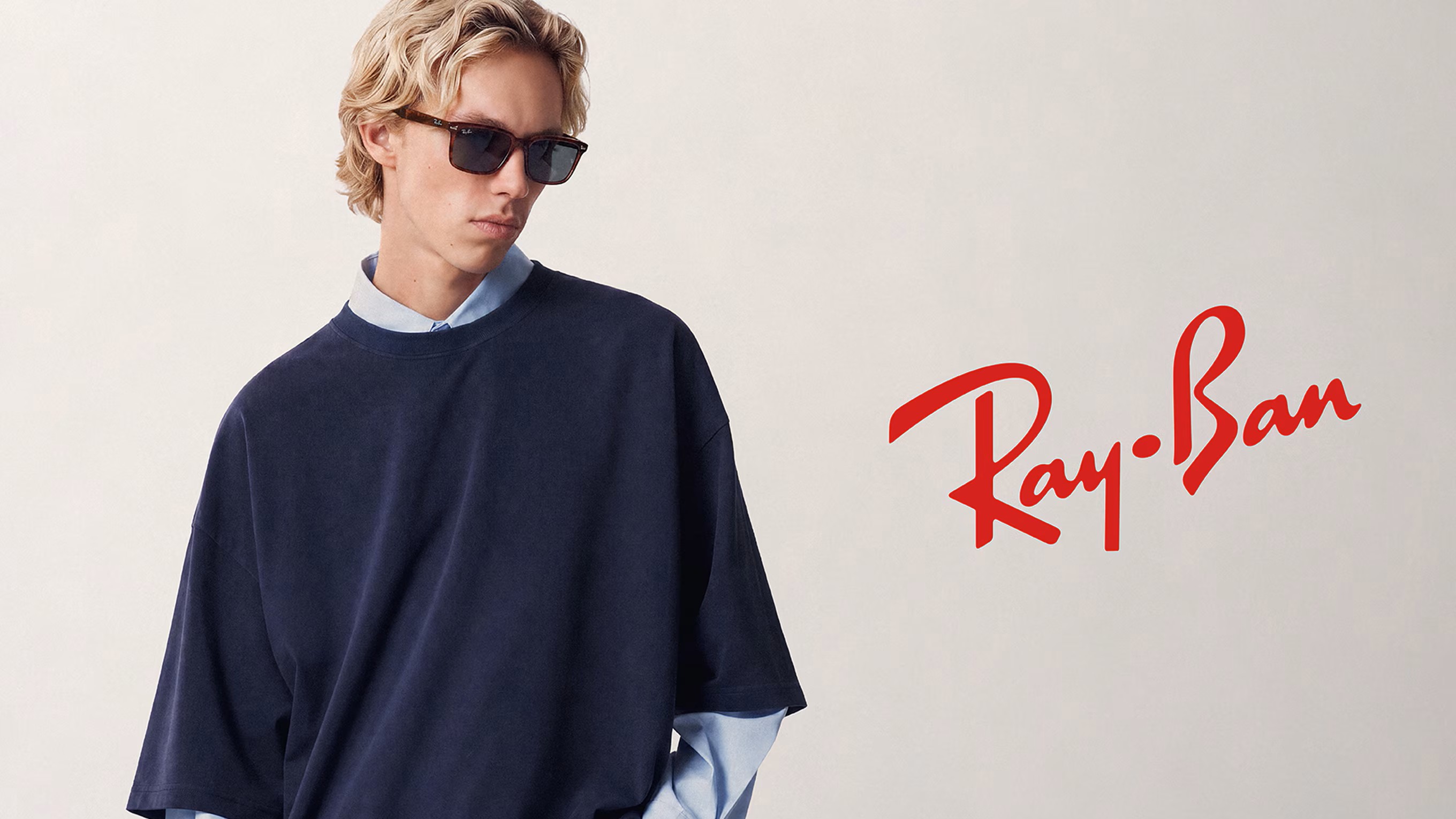 Man wearing Ray-Ban sunglasses