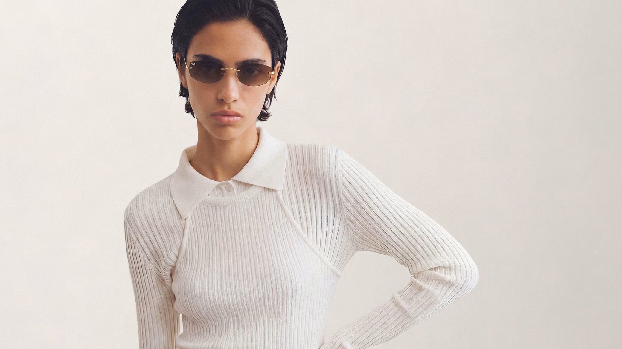 Woman wearing Ray-Ban sunglasses