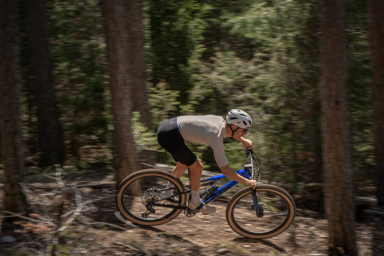 Man riding an MTB in a forest