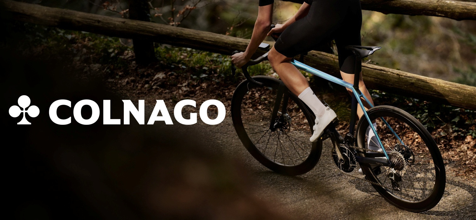 Vyras važiuojantis Colnago plento dviračiu