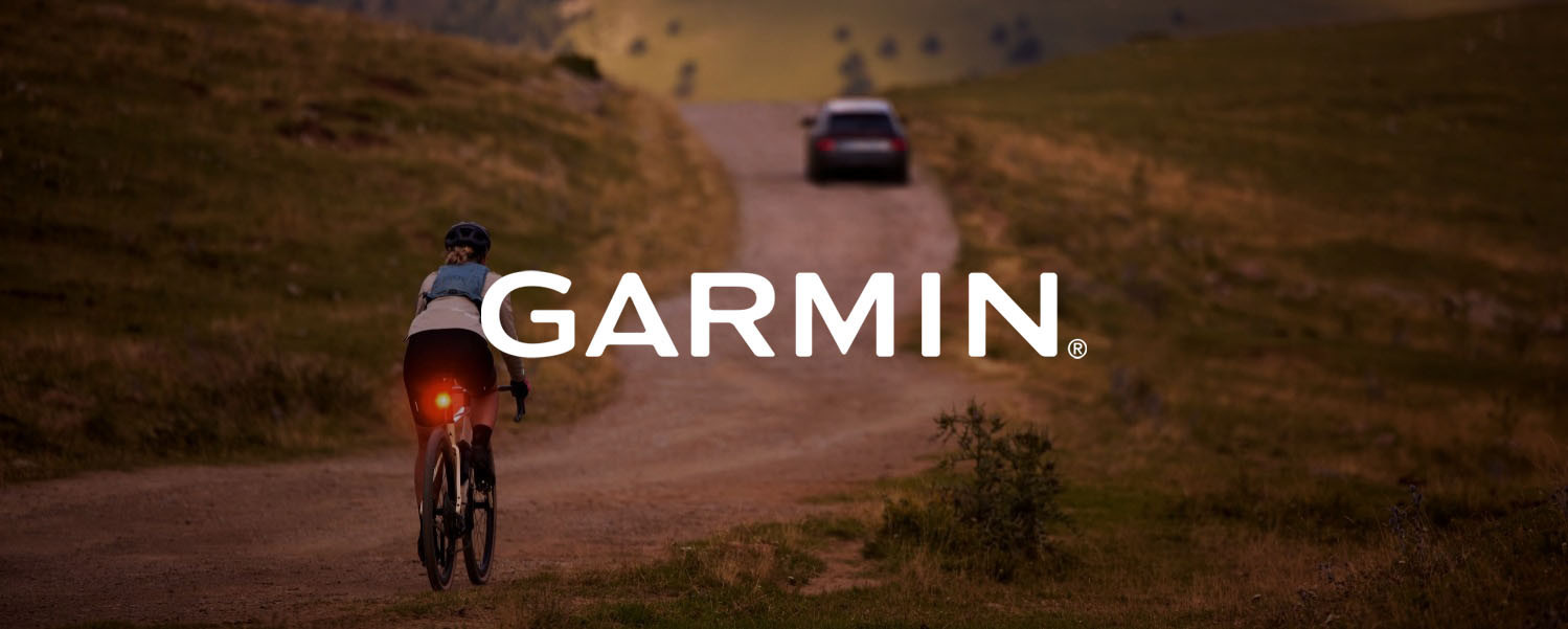 Cyclist riding with a rear bike light