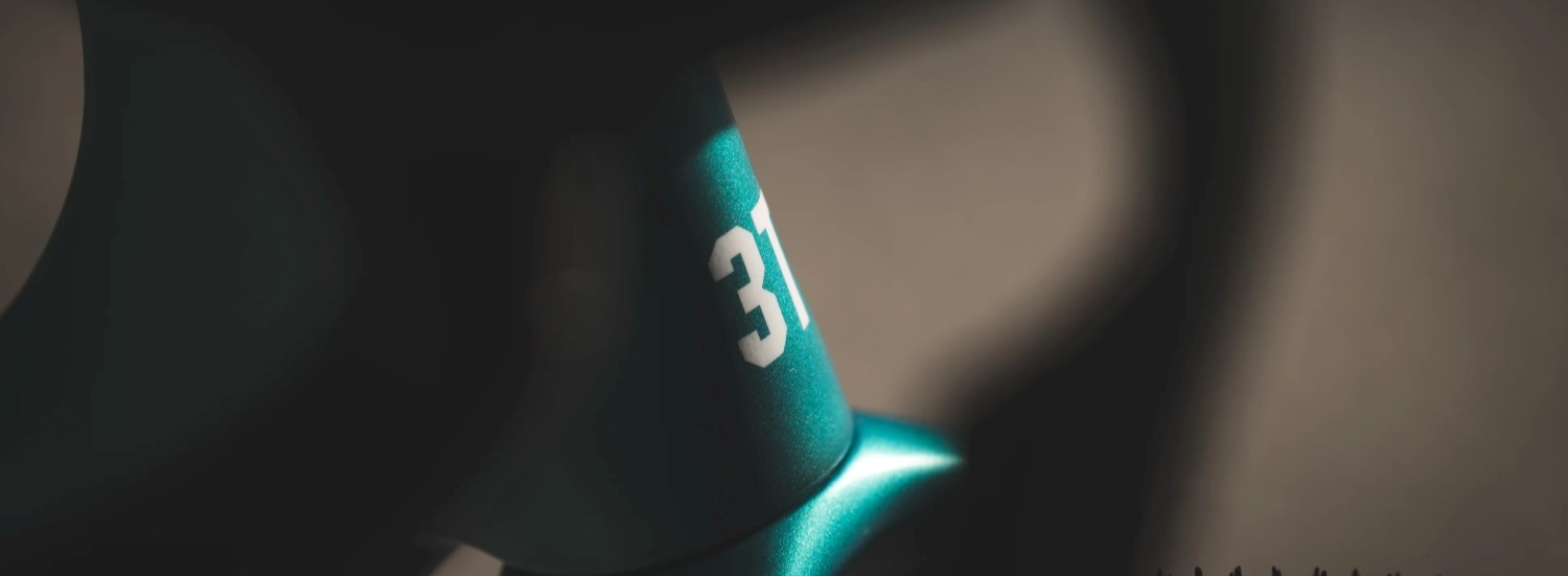 3T logotipas ant dviračio