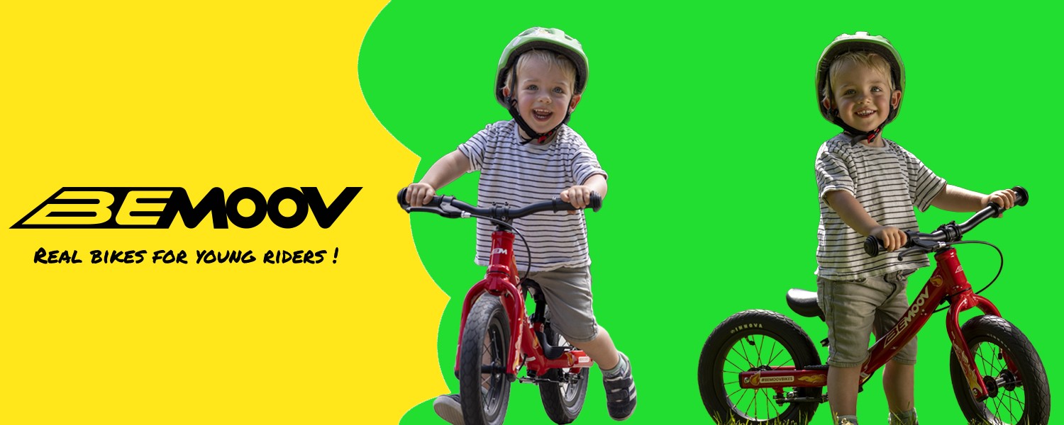 Vaikas su balansiniu dviračiu