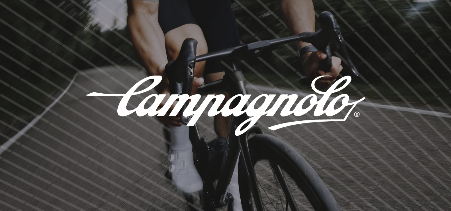 Campagnolo logo with a cyclist in the background