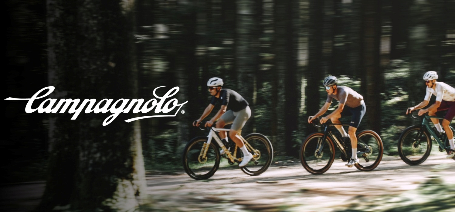 Three cyclists riding gravel bikes