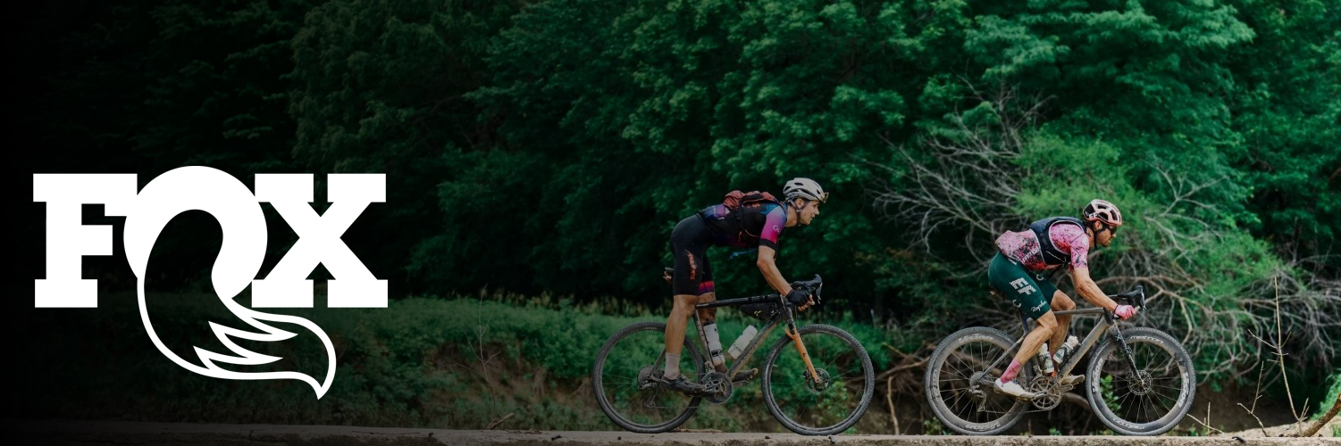 Two men riding gravel bikes