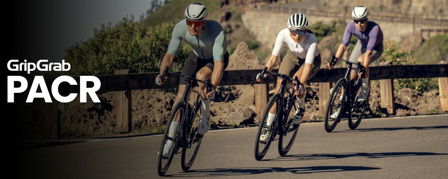Three cyclists riding road bikes