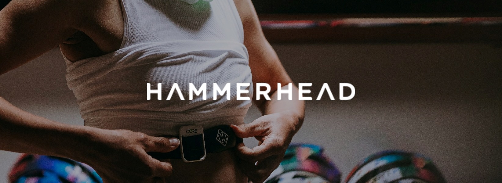 girl wearing a heart rate monitor strap