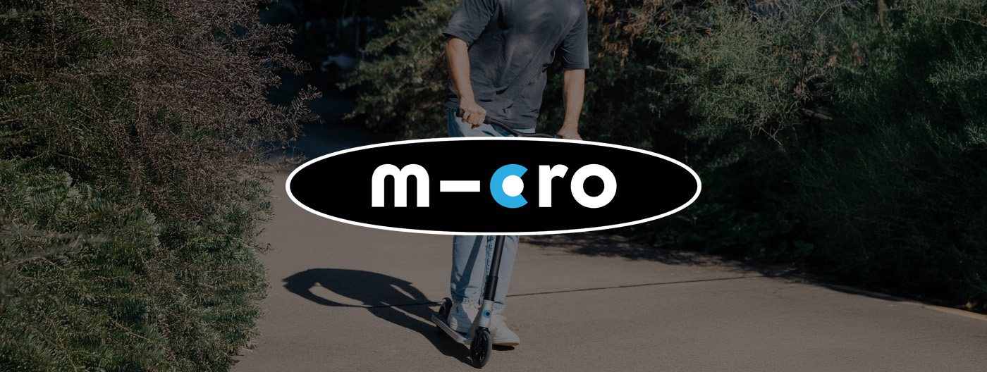 Man riding scooter