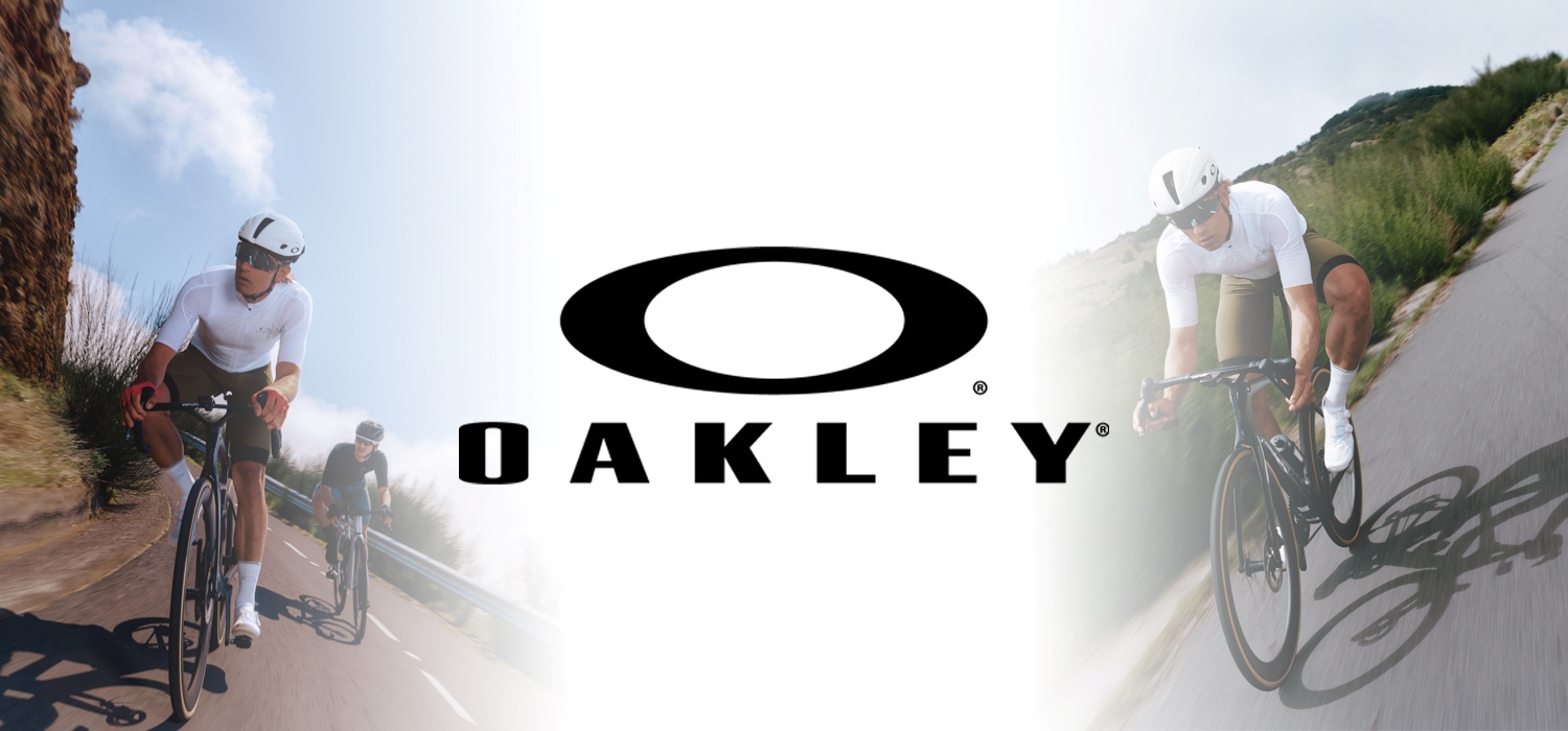 Vyras važiuojantis dviračiu ir Oakley logotipas