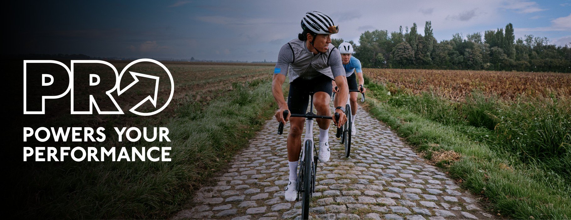 Man and woman riding bicycles on a path