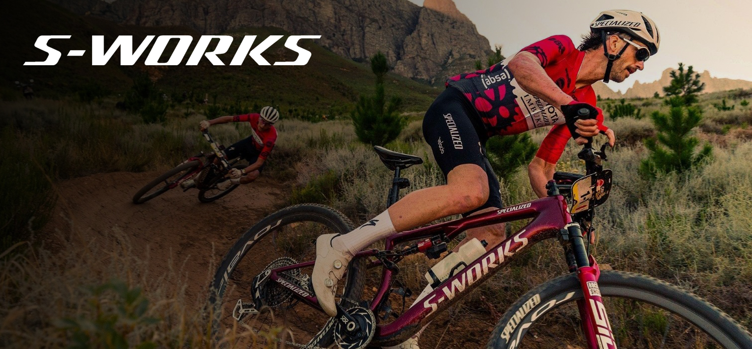 Man riding an MTB bike on a trail